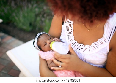 Mother Feeding Baby