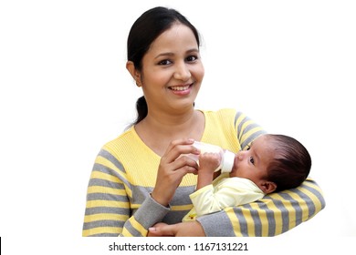 mother feeding child