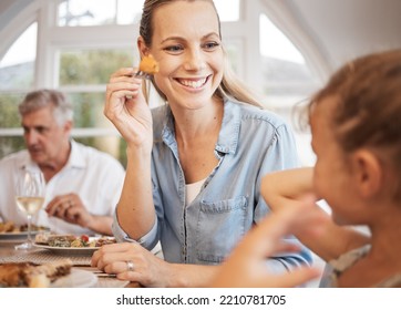 Mother, Girl And Food At Restaurant, Smile And Fork In Hand Playing In Funny Moment With Kid. Mom, Child And Happy At Lunch, Breakfast Or Dinner In Diner Have Comic, Crazy And Silly Time In Berlin