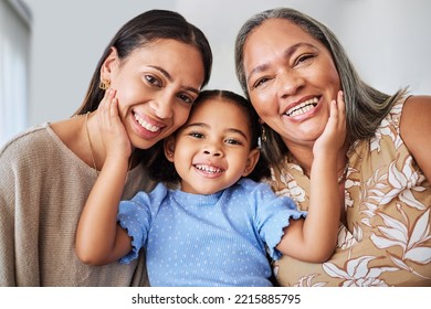 Mother, girl and grandma bond in living room, smile, relax and hug in their home. Face, portrait and happy family of multigenerational women hug, laugh and enjoying quality time at home together - Powered by Shutterstock