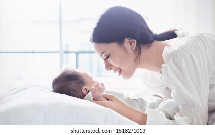 Mother Hands Holding Newborn Baby Feet Stock Photo (edit Now) 1518271013