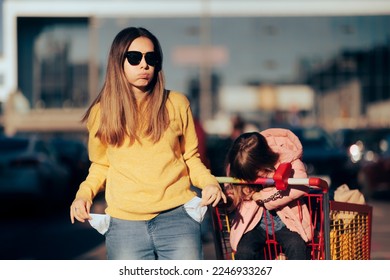 
Mother Having No More Money After Long Shopping Spree. Worried single parent having no money for groceries
