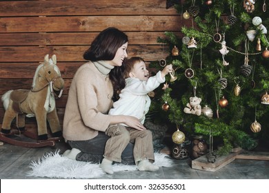 Mother With Her 3 Years Old Son Celebrating Holidays Near Christmas Tree, Farm House Design