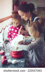 Mother With Her 5 Years Old Kids Cooking Holiday Pie In The Kitchen To Mothers Day, Casual Lifestyle Photo Series In Real Life Interior