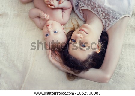 Similar – Image, Stock Photo happy mother and baby playing at home in bedroom