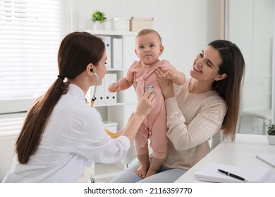 Mother with her cute baby visiting pediatrician in clinic - Powered by Shutterstock