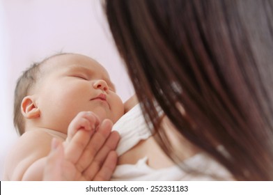 Mother And Her Newborn Baby, Maternity Concept, Soft Image Of Beautiful Family