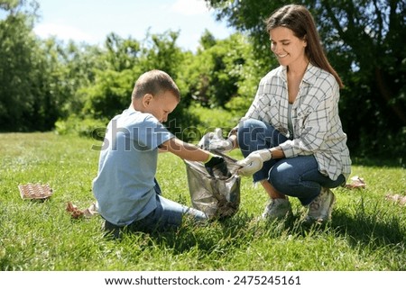 Similar – Image, Stock Photo Little girl and woman carrying basket with apples