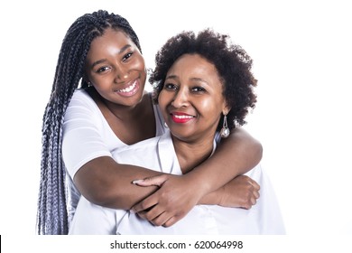 A mother and her teenage daughter isolated on white
