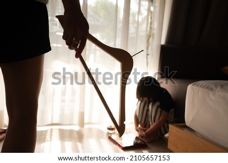 mother hit her kid, children crying, feeling sad, young girl unhappy, family violence concept, selective focus and soft focus
