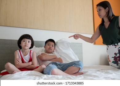 Mother Hit Her Kid, Two Children Crying, Little Girl And Boy Cry, Feeling Sad, Young Child Unhappy, Selective Focus And Soft Focus
