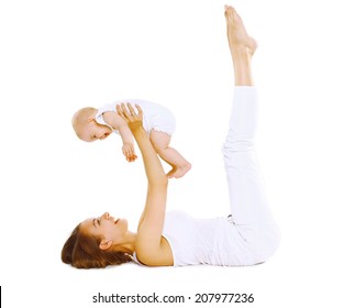 Mother holding baby, fun, exercise, leisure - concept