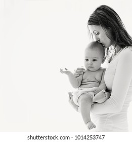 Mother, Holding Her Sick Baby Boy, Sad Baby, Isolated On White Background 