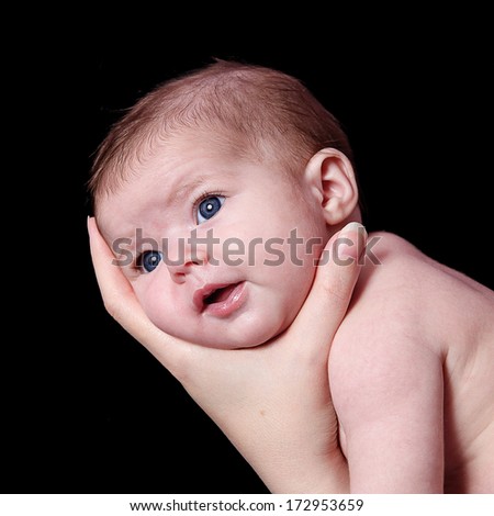 Similar – Baby girl four months old having her bath