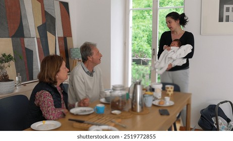 Mother holding newborn in cozy home setting, tender moment, baby wrapped in white blanket, family bond, nurturing care, peaceful scene, early childhood, maternal love - Powered by Shutterstock