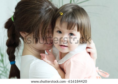 Similar – Image, Stock Photo Beautiful woman and her cute little daughter are hugging