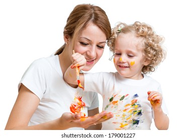 Mother And Kid Girl Painting Together