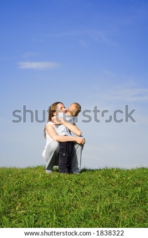 Similar – Mother playing with her daughter on the grass