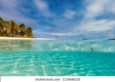 Mother And Kids Family At Tropical Beach On Aitutaki Island, Cook Islands, South Pacific