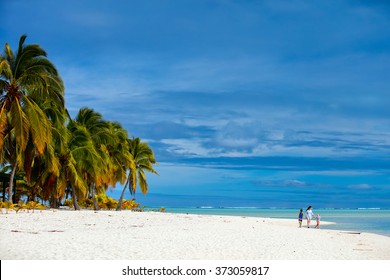 Mother And Kids Family At Tropical Beach On Aitutaki Island, Cook Islands, South Pacific