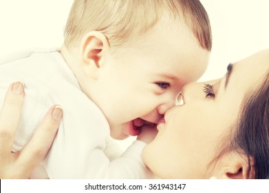 Mother Kissing Her Baby