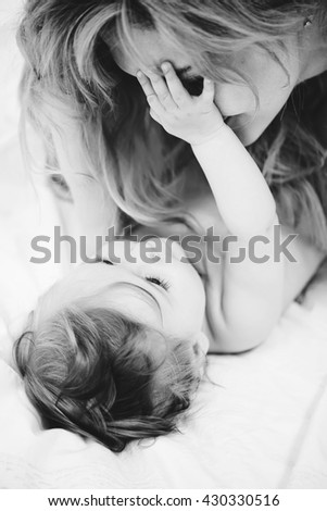 Image, Stock Photo happy mother and baby playing at home in bedroom