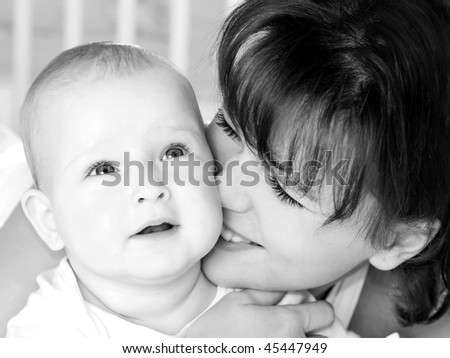 Similar – Image, Stock Photo Beautiful woman and her cute little daughter are hugging