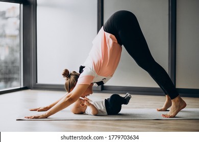 Mother With Little Baby Boy Practice Yoga