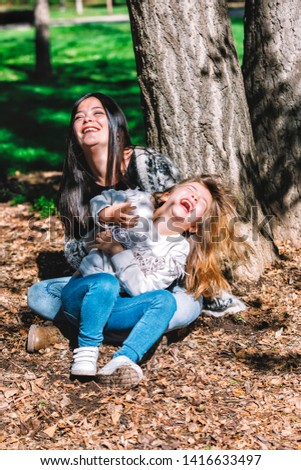 Similar – Frauenfreunde lachend bei Spaziergängen im Wald