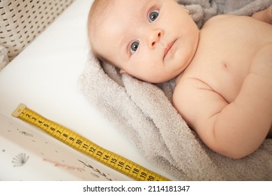 Mother Measuresh The Growth Of Child, Captive Table, Medical Examination. Development, Height. Calculation