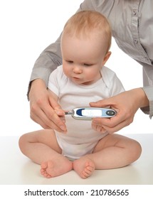 Mother Measuring Glucose Level Blood Chemistry Test From Diabetes Child Baby Using Glucometer On A White Background