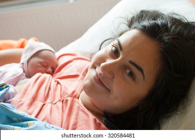 Mother with a new born baby in hospital