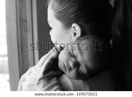 Similar – Mother and cute little baby girl sleeping