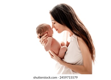 a mother with a newborn baby boy hugs and kisses gently holding him in her arms on a white isolated background of a house window. - Powered by Shutterstock