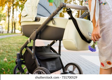 mother over a stroller