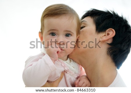 Similar – Image, Stock Photo Beautiful woman and her cute little daughter are hugging