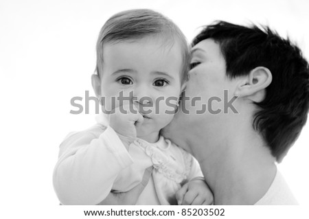 Similar – Image, Stock Photo Beautiful woman and her cute little daughter are hugging