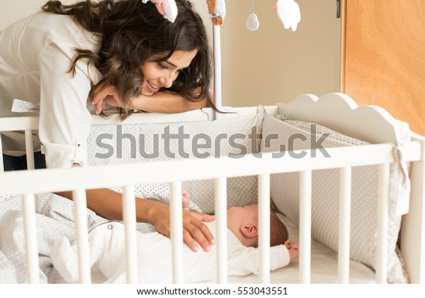 Mother Putting Baby Sleep Crib Stock Photo Edit Now 553043551