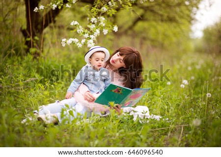 Similar – Reading stories Parenting