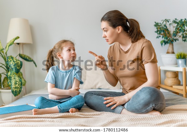 mother\
is scolding her child girl. family\
relationships
