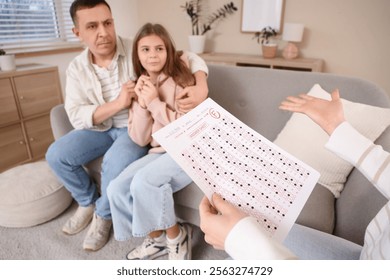 Mother scolding her daughter for school test at home, closeup - Powered by Shutterstock