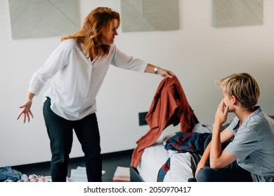 Mother Scolding Son For Messy Bedroom