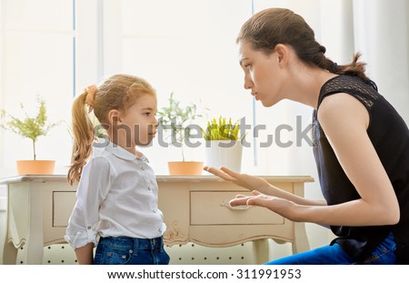 mother scolds her child