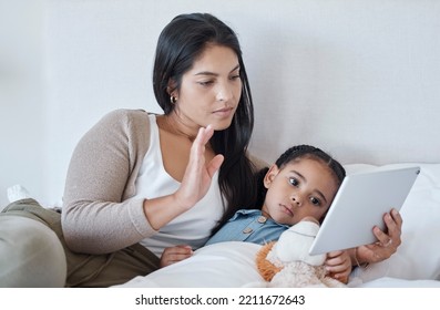 Mother And Sick Child, Video Call And With Tablet For Telehealth Online Consultation For Daughter Lying In Bed. Serious Woman And Kid In Bedroom Greeting With 5g Network Communication For Healthcare