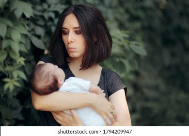 Mother Singing To Her Baby Outdoors In The Park