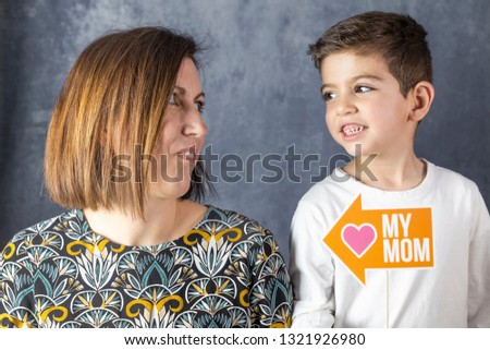 Mother and son celebrating mothers day at home