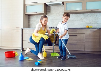 Mother and son are cleaning the apartment. - Powered by Shutterstock