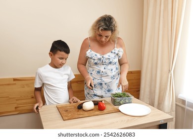 Mother and son cooking pizza at home. - Powered by Shutterstock