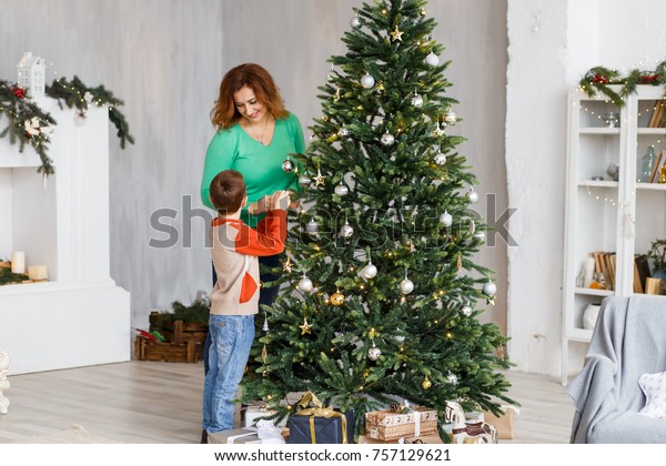 Mother Son Decorating Furtree Fireplace Candles Stock Photo Edit