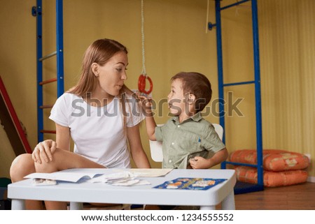 Similar – Image, Stock Photo boy Parenting Education